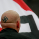 Illustration for article titled Leader of Neo-Nazi Group Pleads Guilty to Harassing Journalists and Advocates of Color